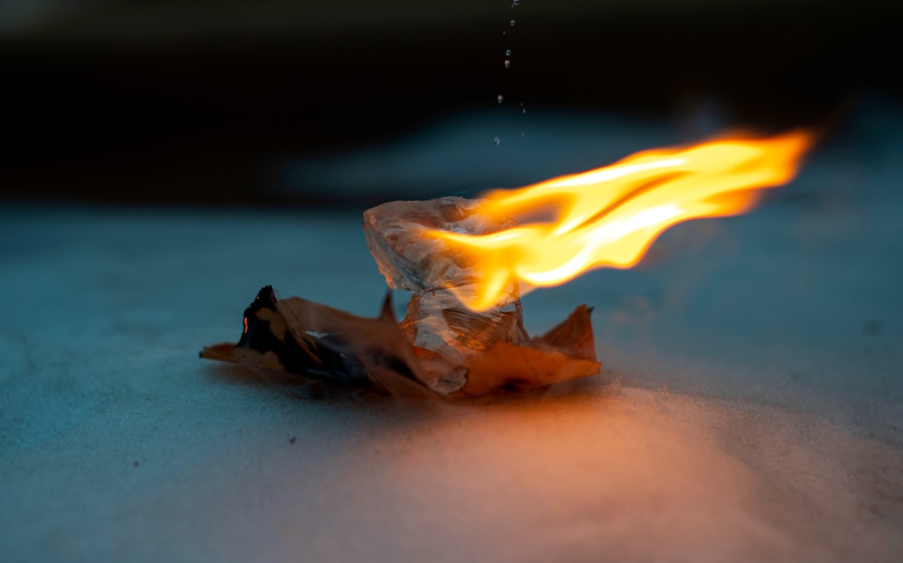 a piece of paper that is on fire