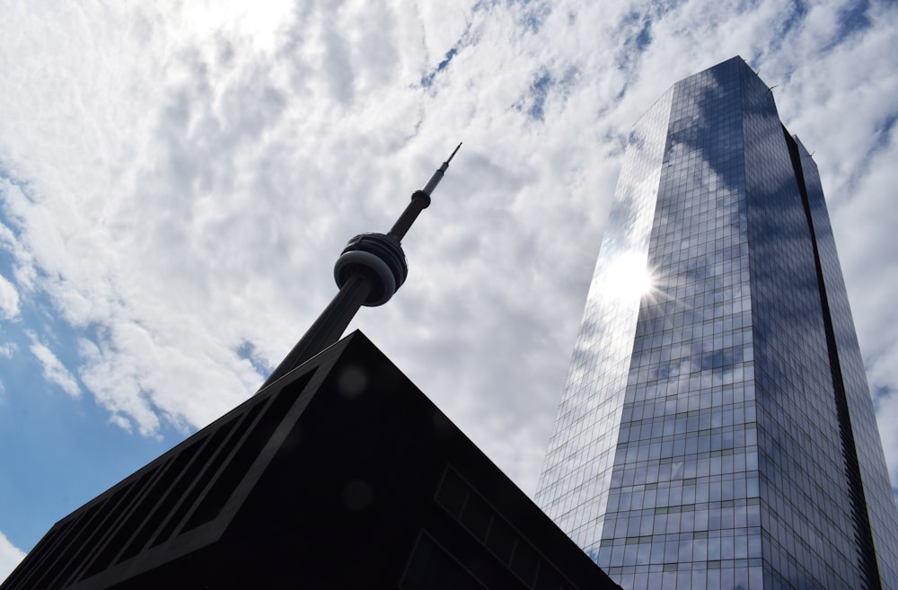 a very tall building with a very tall tower in the background