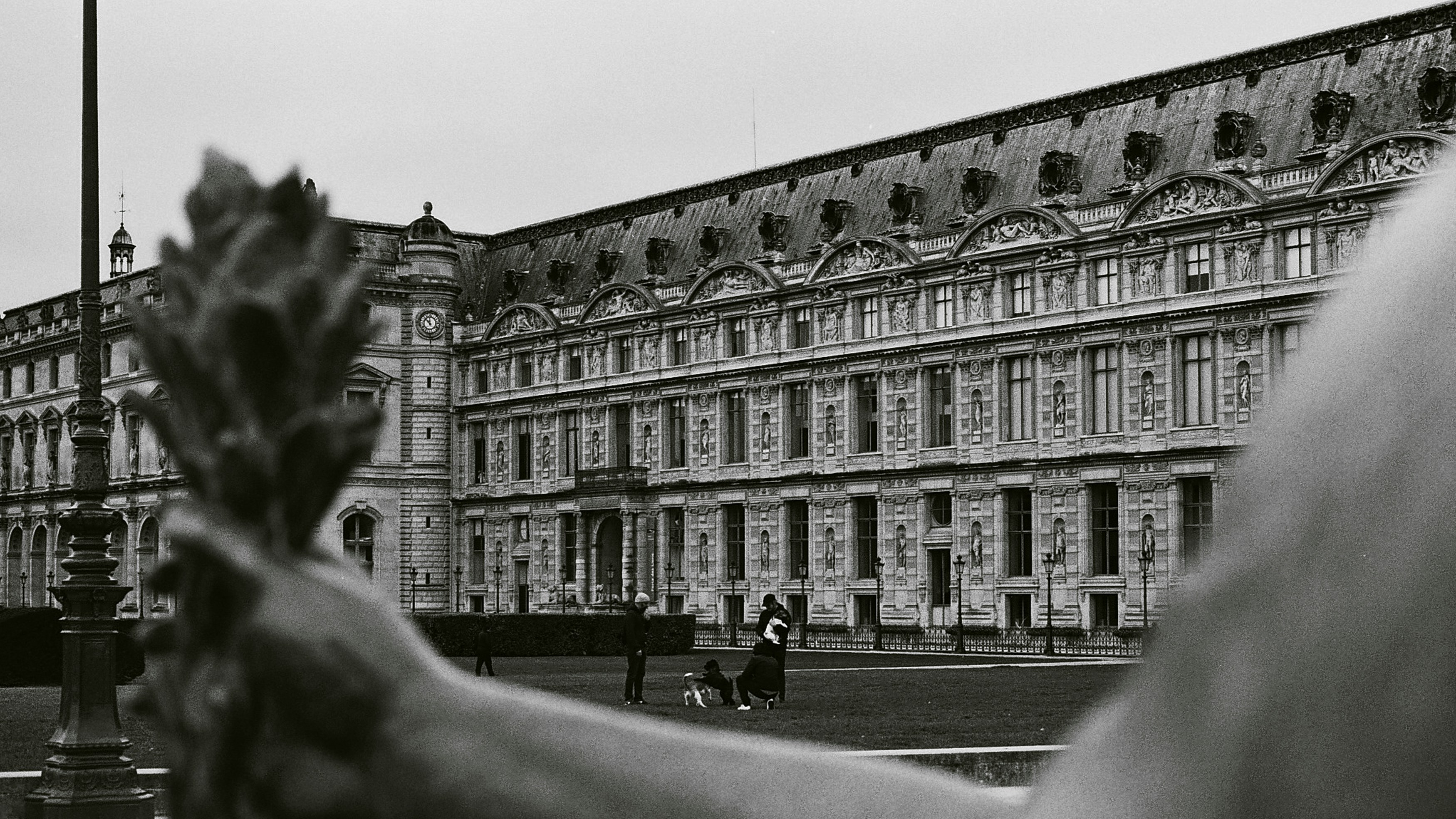 a black and white photo of a large building