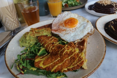 A platter featuring perfectly seasoned chicken paired with fluffy waffles.