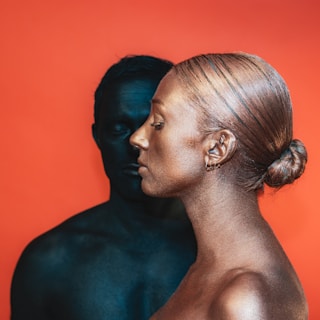 a man and a woman standing next to each other