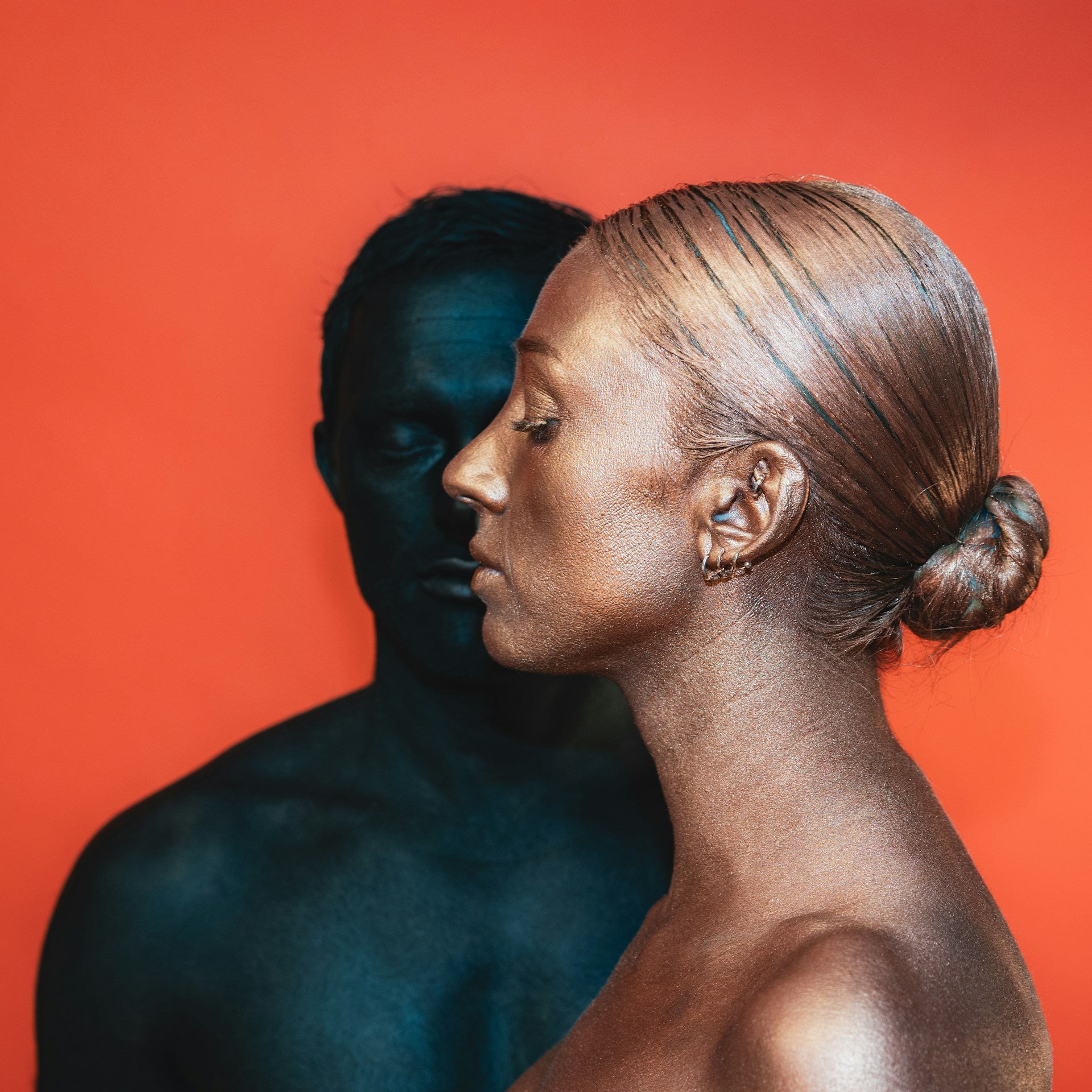 a man and a woman standing next to each other