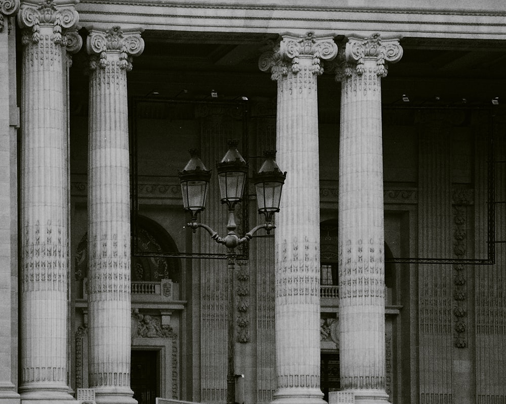 a black and white photo of a building with columns