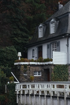 A freshly renovated traditional slate roof on a charming countryside house.