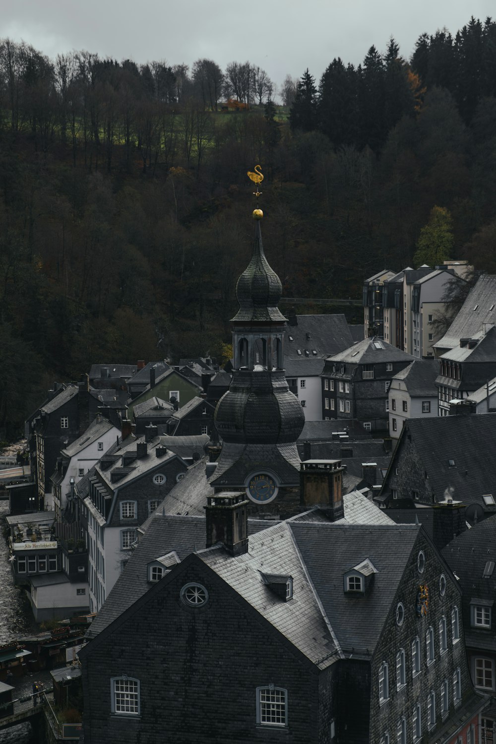 a view of a town with a clock tower