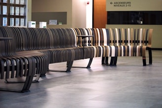 Custom wooden benches and cabinetry in a condominium lobby.