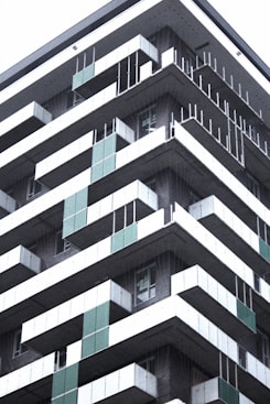 a tall building with balconies and balconies on it