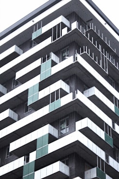 a tall building with balconies and balconies on it