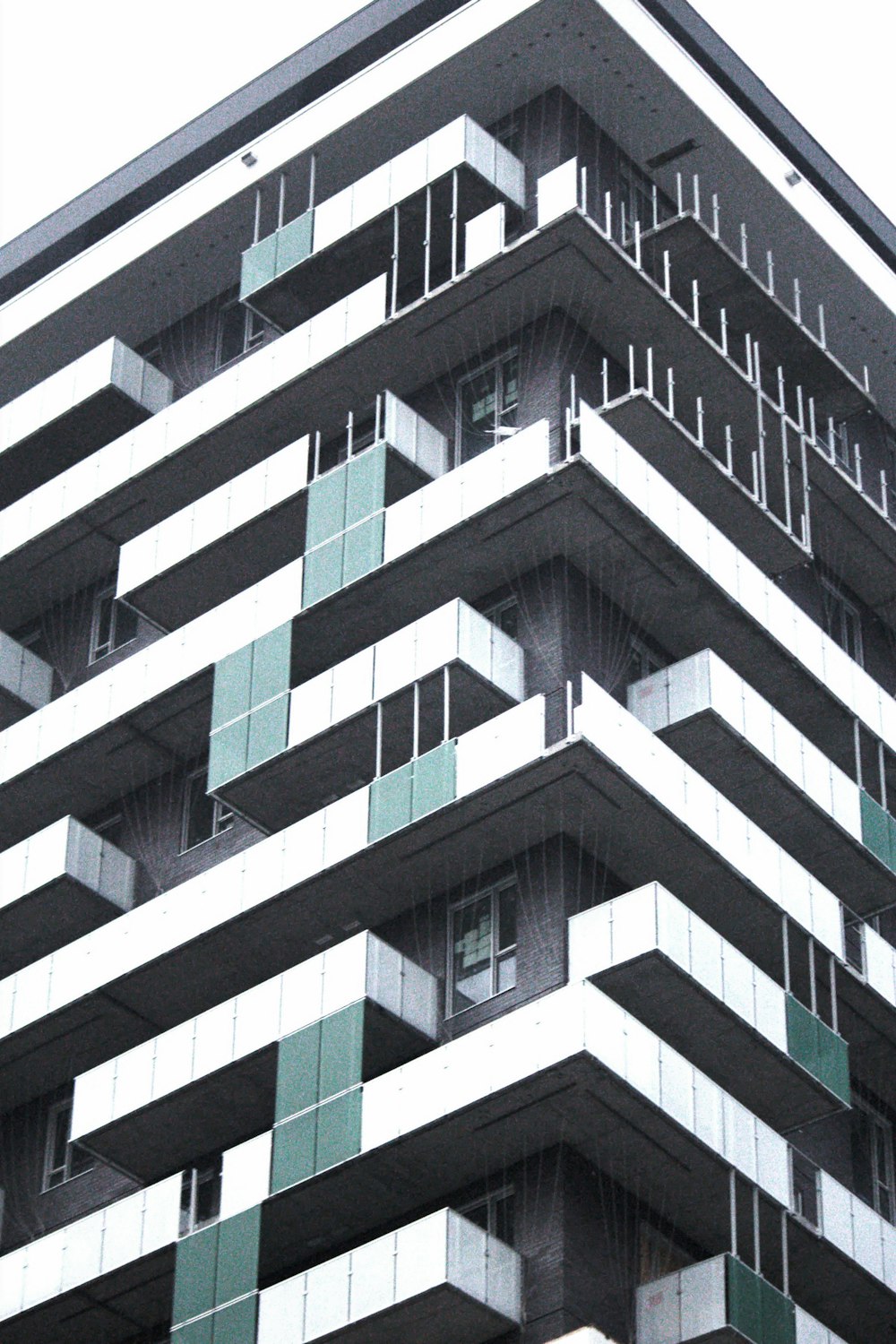 a tall building with balconies and balconies on it