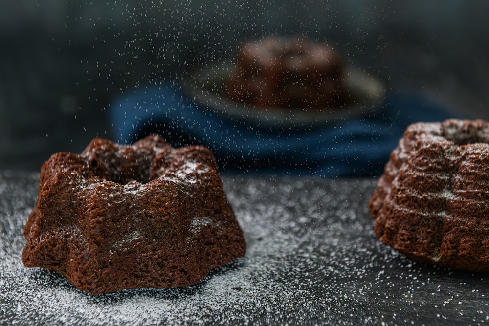 a chocolate bundt cake sitting on top of a table