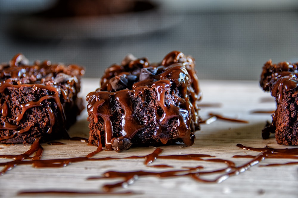 a close up of some brownies on a table