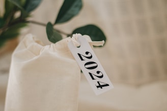 a close up of a bag with a tag on it