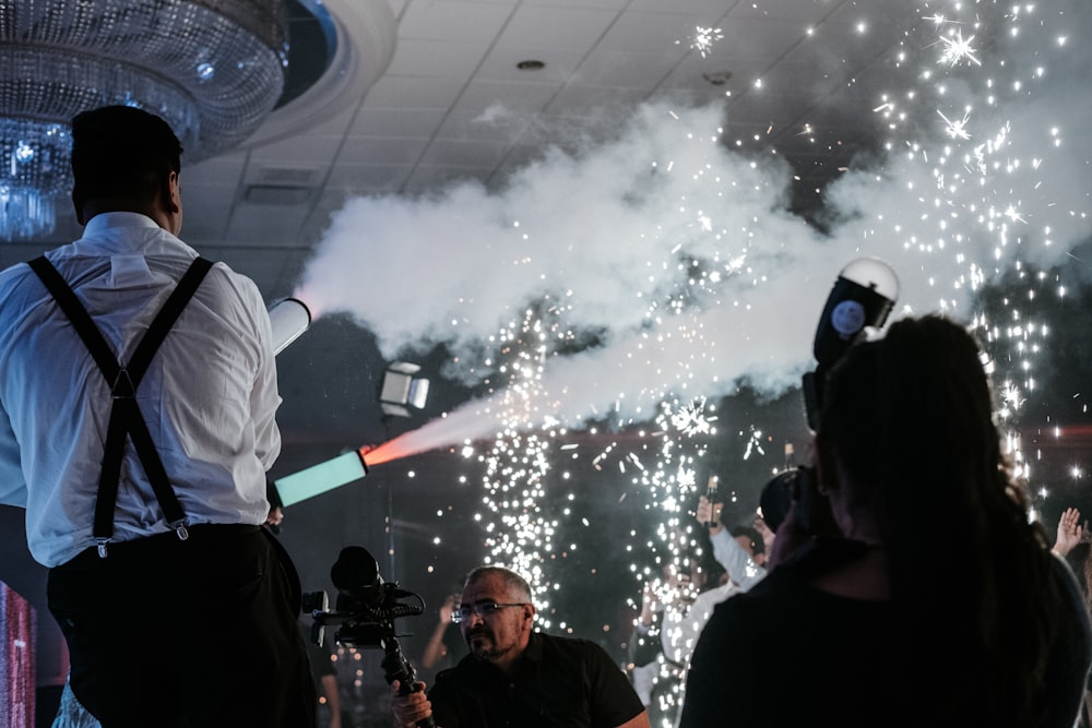 a man standing in front of a crowd of people