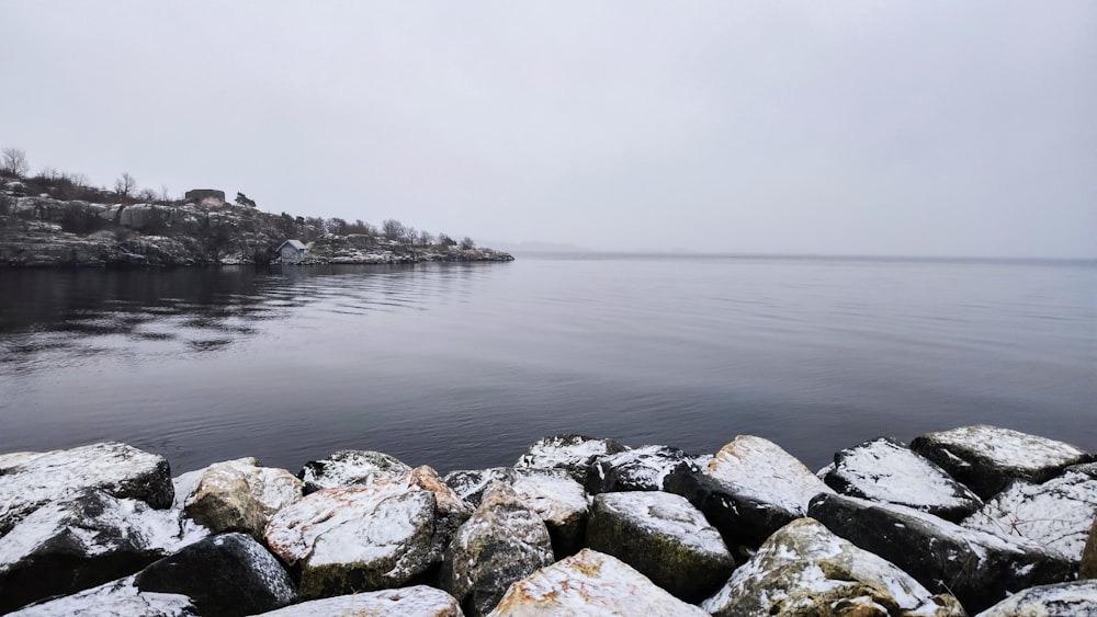 a view of a body of water covered in snow