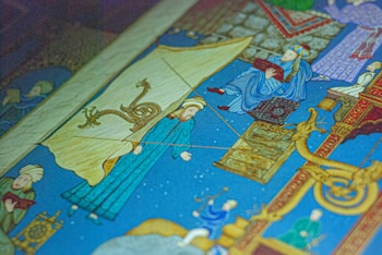 A vibrant, intricately detailed illustration featuring people in traditional attire, possibly from a historical or cultural context, accompanied by mythical creatures and ornate patterns.