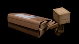 a cardboard box with a face on it