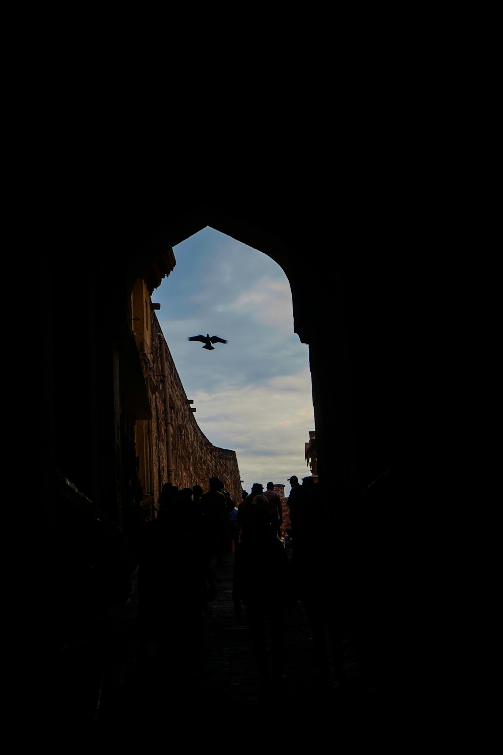 an airplane flying through a tunnel in the sky