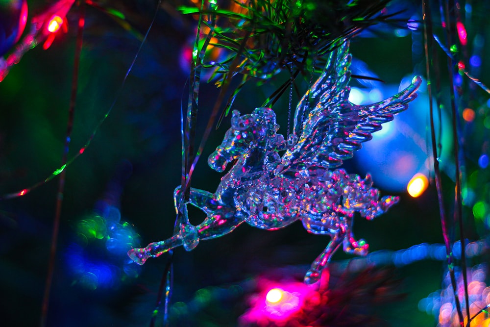a close up of a christmas ornament on a tree