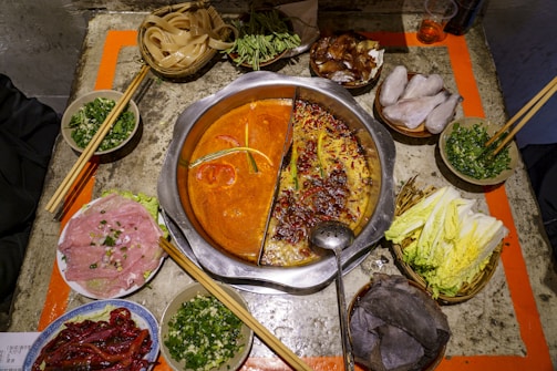 a table topped with lots of different types of food
