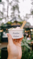 A close-up of delicious Italian gelato in a quaint outdoor setting