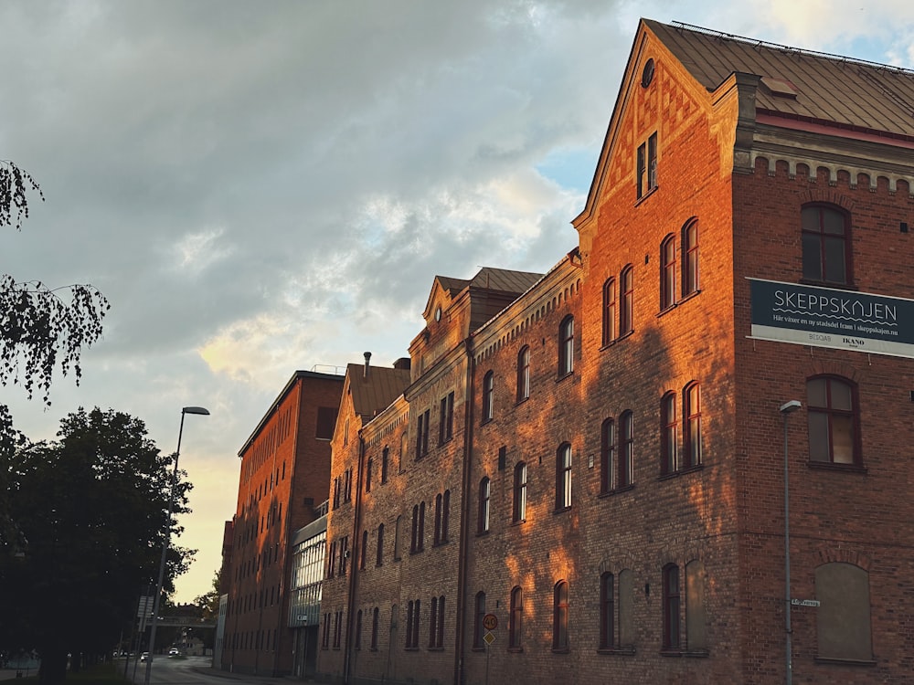 a brick building with a sign on the front of it