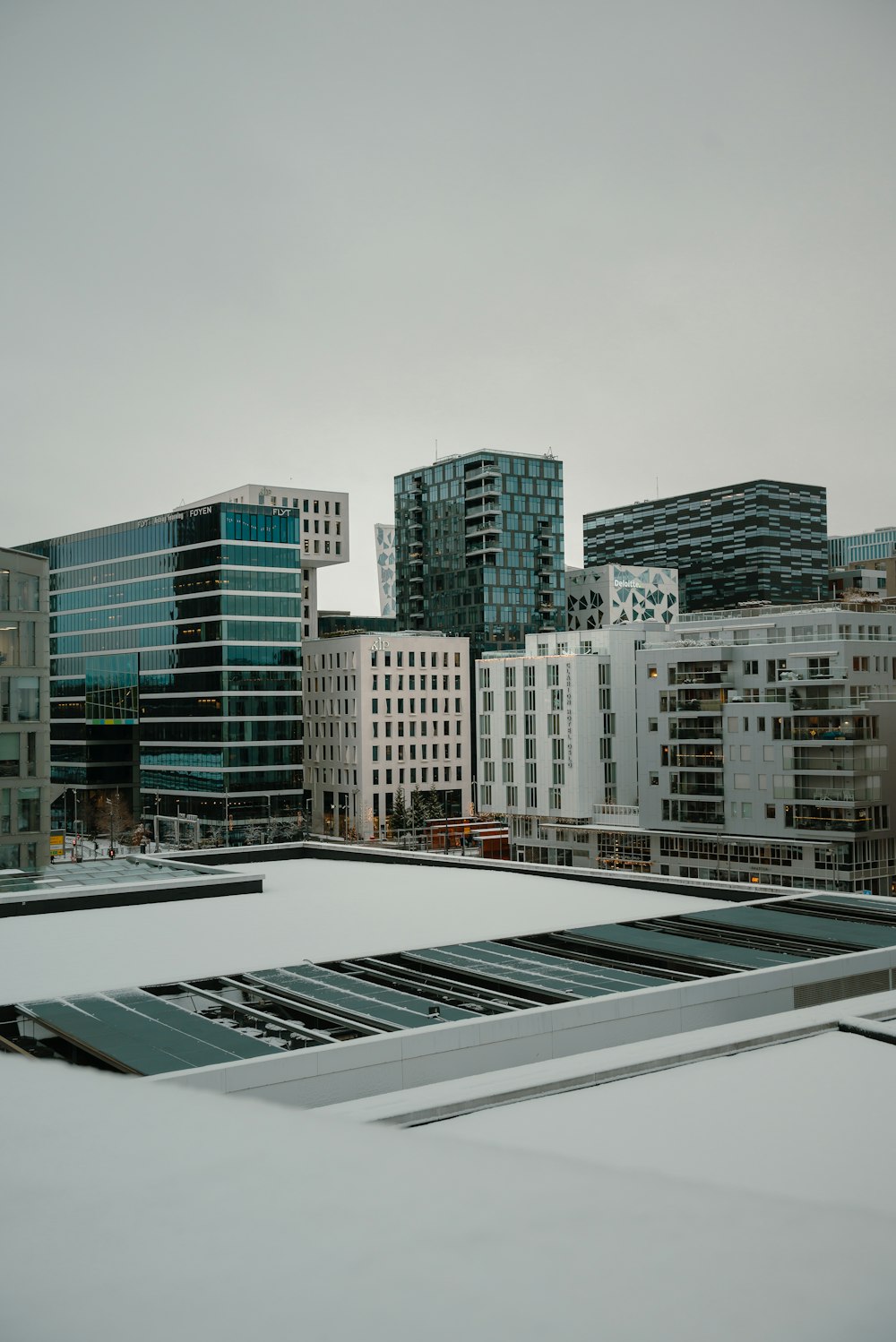 a view of a city with tall buildings