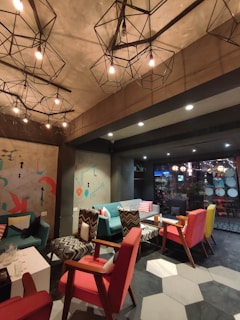 A bright communal area with comfortable seating and vibrant decor.