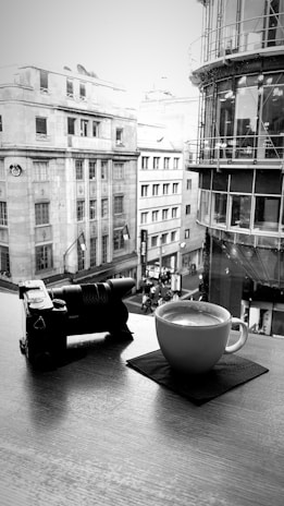 Mohamed Shakeel capturing a scenic view of a local café with his camera.