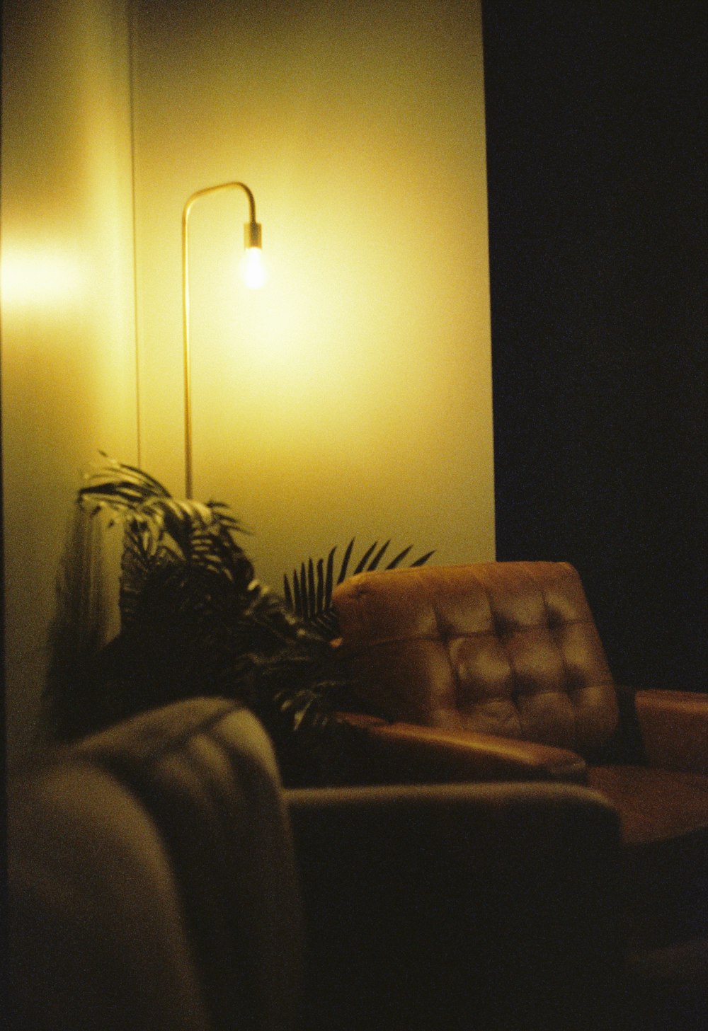 a chair and a lamp in a room