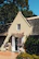 Elegant key handover moment at a bright, airy Breton cottage.