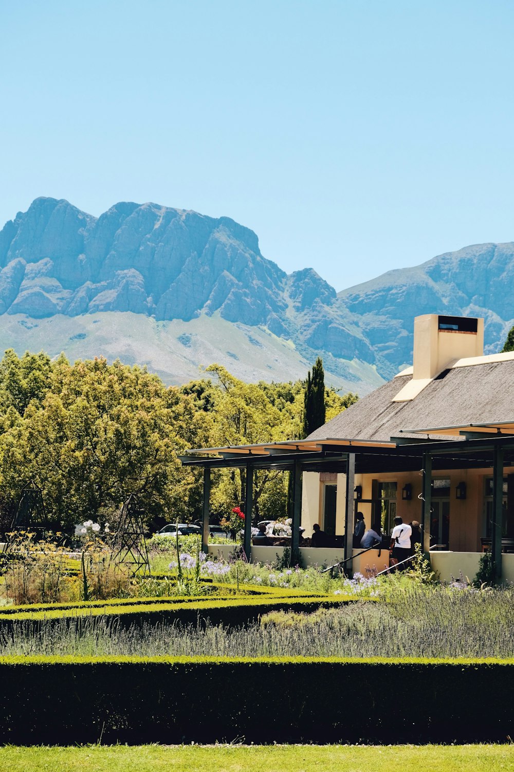 a house with mountains in the background