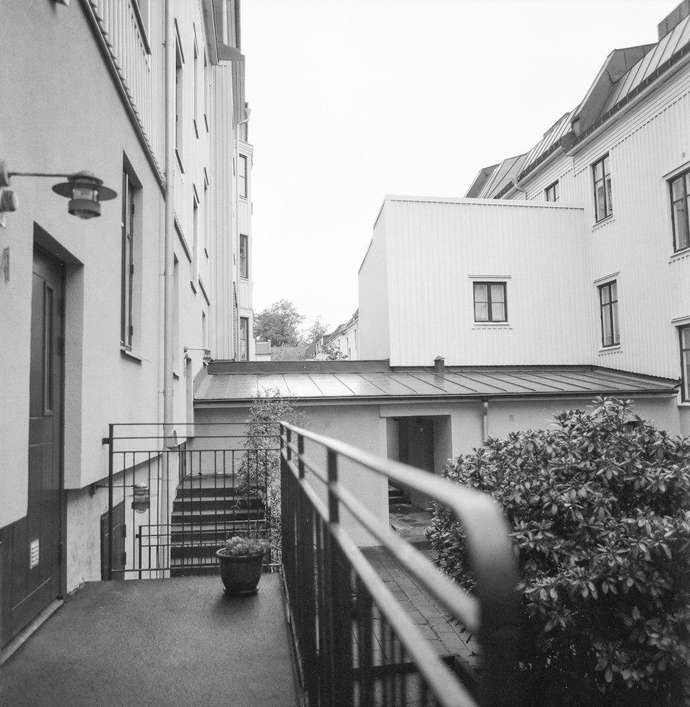 a black and white photo of a balcony