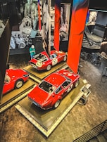A collage of memorabilia from the Alabama Gang's racing history.