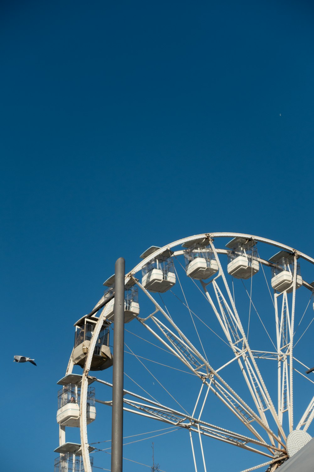 a ferris wheel with a blue sky in the background