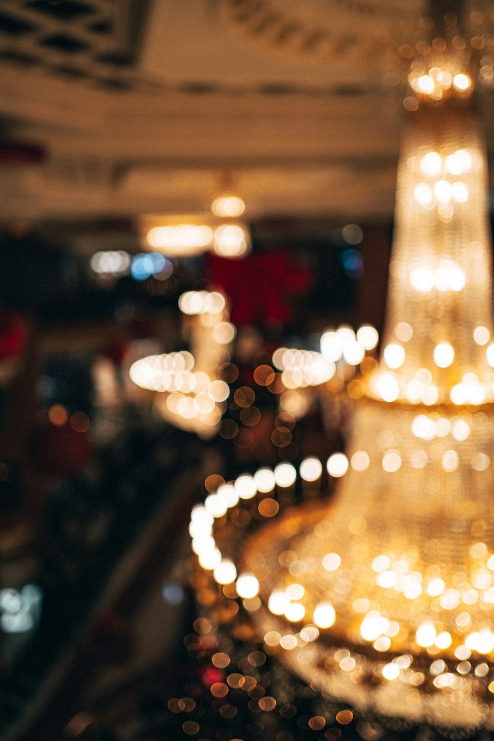 a chandelier with many lights in the background