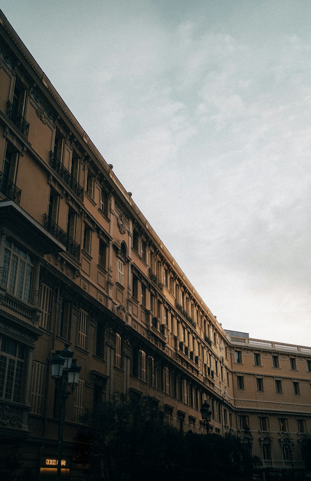 a tall building with a clock on the side of it