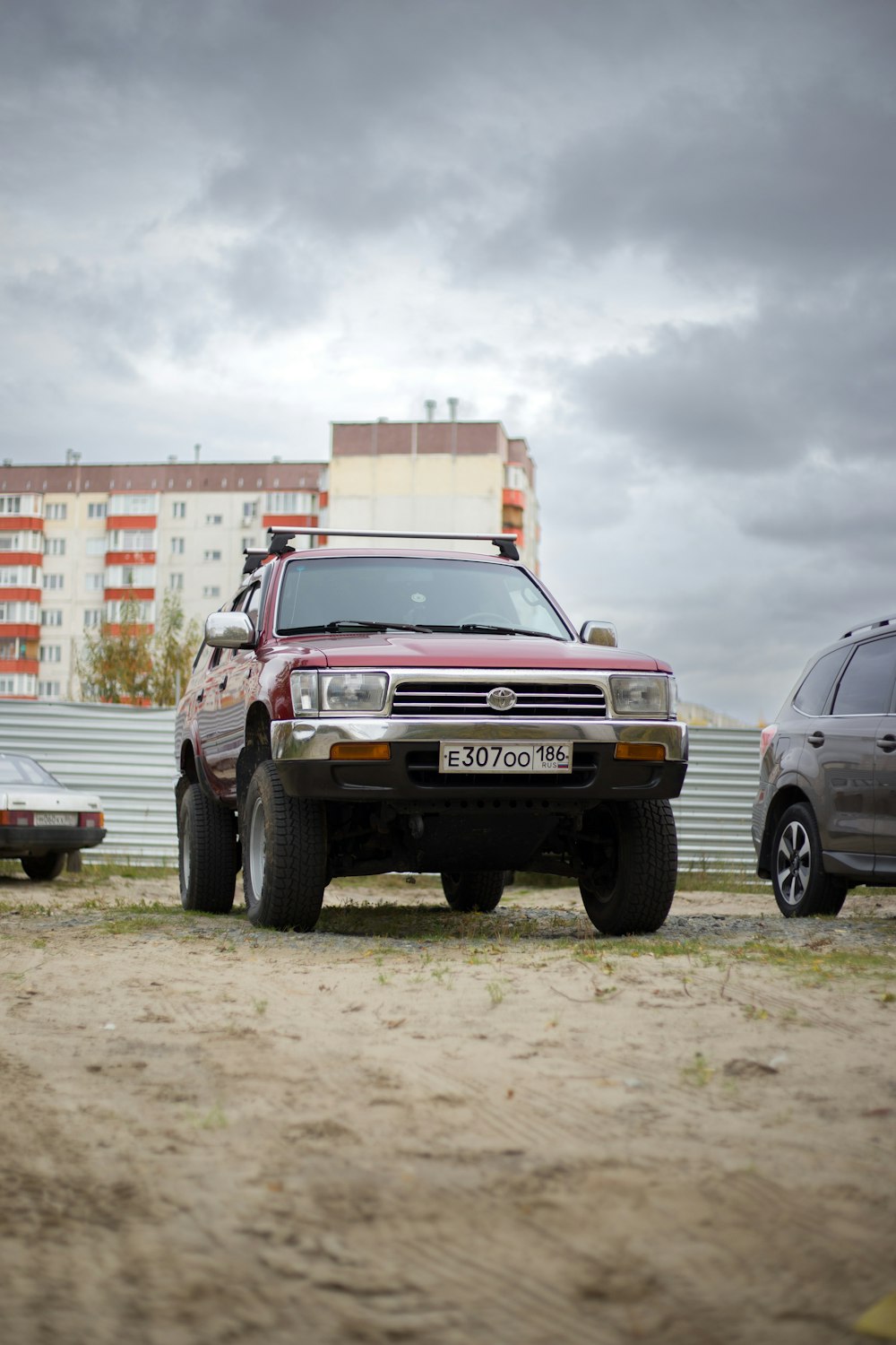 a couple of cars parked next to each other