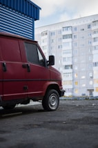 Service van parked outside building