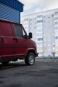 Mobile service van parked in front of a home ready for a glass repair appointment.