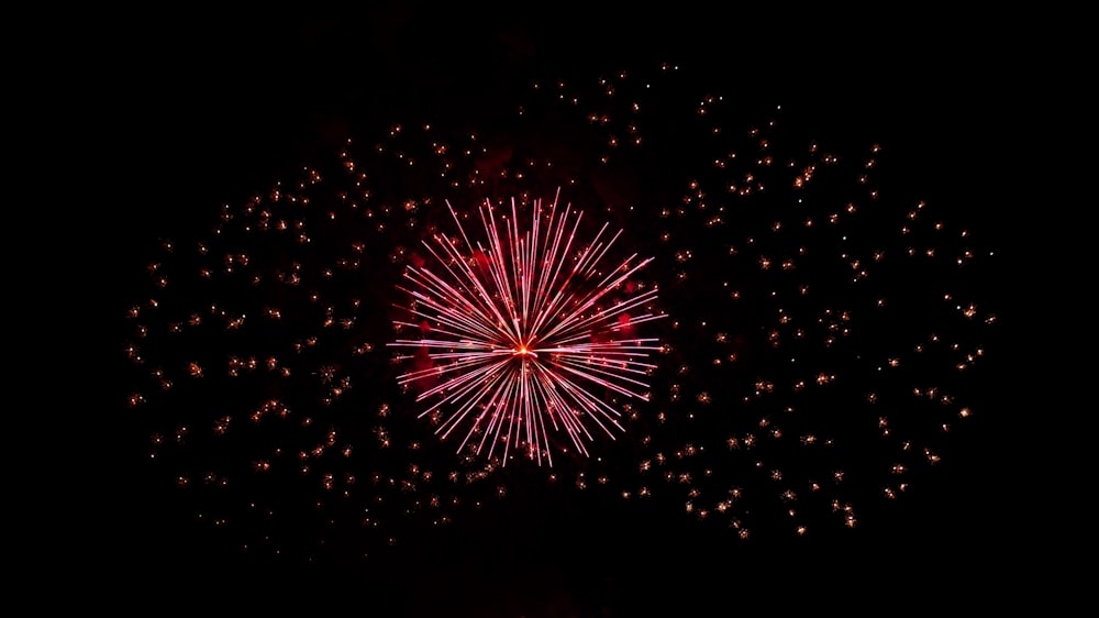 a colorful fireworks display in the night sky