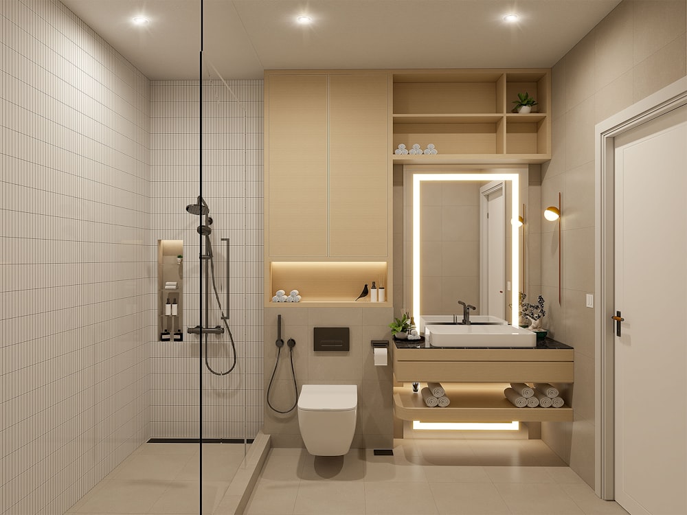 a bathroom with a shower, toilet, sink and mirror