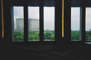 Large windows offering natural light and views of the city.