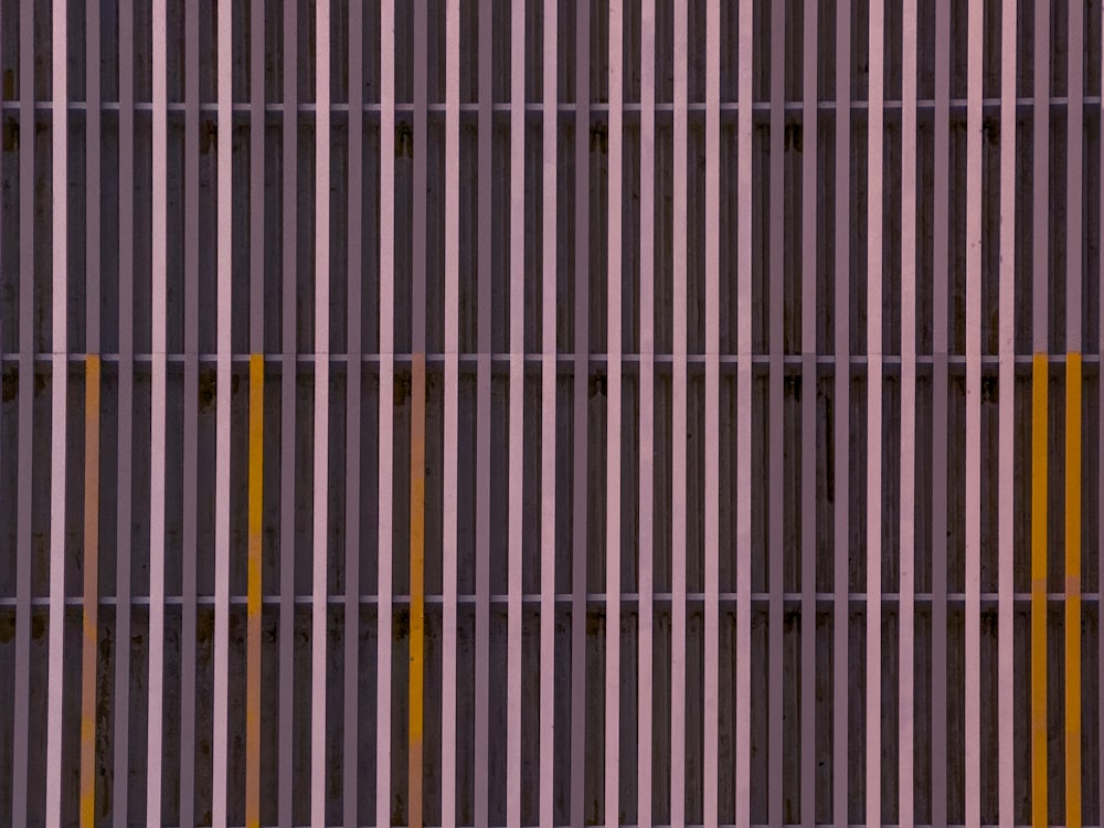 a close up of a wall made of metal bars