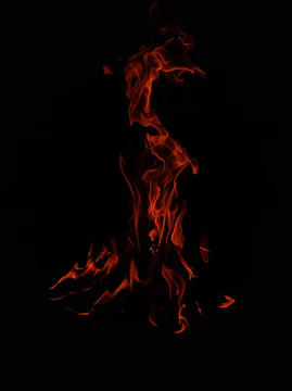 A vibrant red flame dancing, representing passion and transformation.
