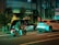 A nighttime street scene featuring a motorcyclist in a helmet and jacket stopped beside a black taxi with 'S.RIDE' written on its side and a white SUV in front. The street is lined with buildings and trees, illuminated by neon lights with a greenish hue creating reflections on the vehicles.