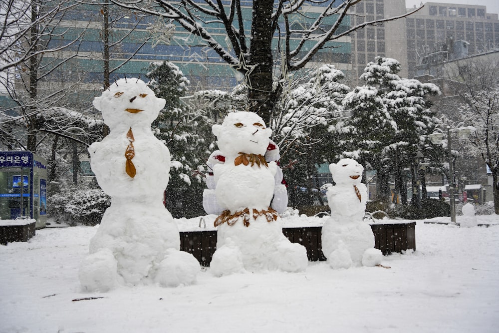 a group of snowmen standing next to each other