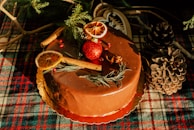 A stylishly crafted cake featuring seasonal decorations.