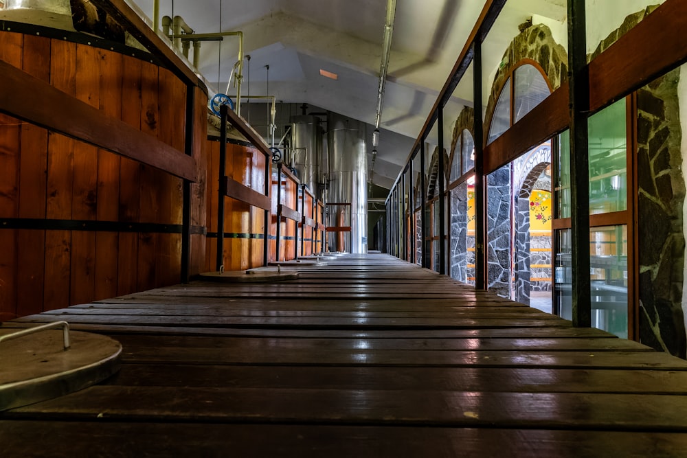 a long wooden walkway leading to a building