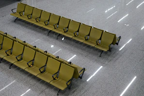 Peaceful waiting area featuring comfortable seating and greenery.