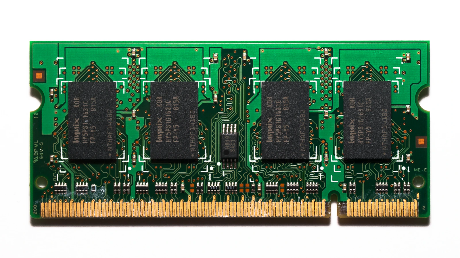 Close-up of a computer memory RAM module on a white surface